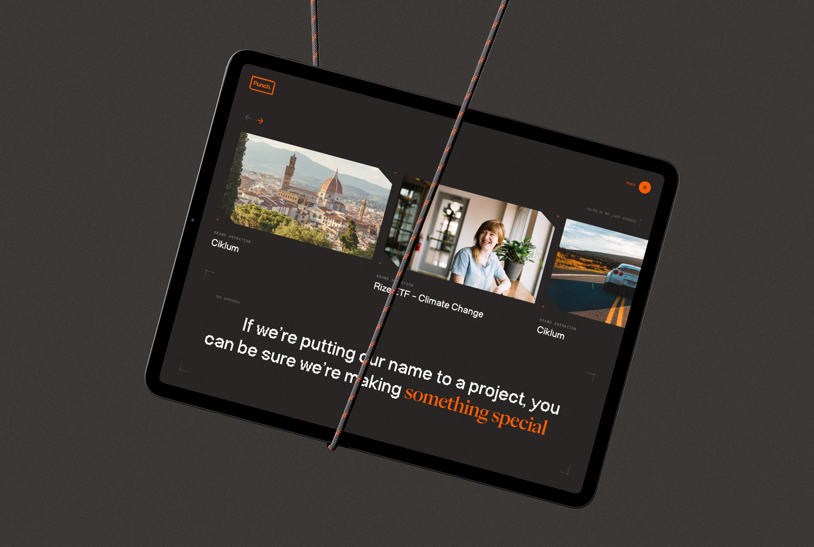 A case study carousel and pull quote shown mocked up on an iPad, hanging by a rope