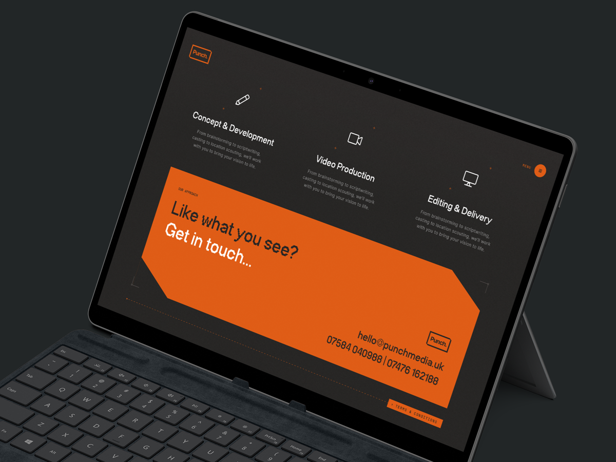 The contact us section of the Punch Media website mocked up on a tablet